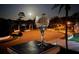 Enjoy a glass of wine while taking in the beautiful night view of the neighborhood at 2817 Bay Side Dr, New Smyrna Beach, FL 32168