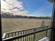 Spacious balcony with scenic views of a lush green landscape at 2870 Isles Way, New Smyrna Beach, FL 32168