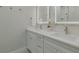 Elegant bathroom with double vanity and a glass shower at 2870 Isles Way, New Smyrna Beach, FL 32168