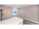 Bedroom with ocean view and laminate floors at 2947 S Atlantic Ave # 1105, Daytona Beach Shores, FL 32118