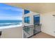 Ocean view from private balcony with a blue sky at 2947 S Atlantic Ave # 1105, Daytona Beach Shores, FL 32118