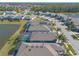 Aerial view of houses with pools in a community at 3014 Borassus Dr, New Smyrna Beach, FL 32168