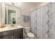 Clean bathroom with shower, toilet and modern vanity at 3014 Borassus Dr, New Smyrna Beach, FL 32168