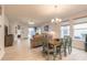 Bright dining area with seating for four and an open floor plan at 3014 Borassus Dr, New Smyrna Beach, FL 32168