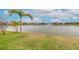 Scenic backyard oasis overlooking a tranquil lake at 3014 Borassus Dr, New Smyrna Beach, FL 32168