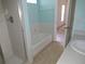 Bathroom with shower, bathtub and vanity at 3020 Kumquat Dr, Edgewater, FL 32141