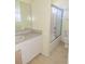 Bathroom with tub, shower, and vanity at 3020 Kumquat Dr, Edgewater, FL 32141