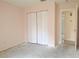 Empty bedroom with double door closet at 3020 Kumquat Dr, Edgewater, FL 32141