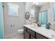 Bathroom with single vanity, toilet and shower/tub combo at 3037 Borassus Dr, New Smyrna Beach, FL 32168