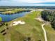 Aerial view of a lush green golf course at 3037 Borassus Dr, New Smyrna Beach, FL 32168