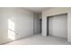 Unfinished bedroom with window, closet, and concrete floors at 3055 Isles Way, New Smyrna Beach, FL 32168