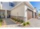 Modern home entry and attached garage with stone accents at 3055 Isles Way, New Smyrna Beach, FL 32168