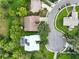 Aerial view of house and neighborhood, showing cul-de-sac at 3084 Heartleaf Pl, Winter Park, FL 32792