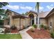 House exterior showcasing walkway and landscaping at 3084 Heartleaf Pl, Winter Park, FL 32792