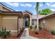 House exterior featuring walkway and landscaping at 3084 Heartleaf Pl, Winter Park, FL 32792