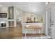 Living room with fireplace, hardwood floors, and dining area view at 3084 Heartleaf Pl, Winter Park, FL 32792