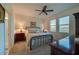 Spacious bedroom with a metal bed frame and carpeted flooring at 3191 Crab Trap Dr, New Smyrna Beach, FL 32168