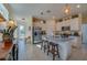 Modern kitchen with stainless steel appliances and granite countertops at 3191 Crab Trap Dr, New Smyrna Beach, FL 32168