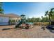 Community playground with playset, slide, and shaded seating at 3191 Crab Trap Dr, New Smyrna Beach, FL 32168