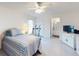 Bright bedroom with a comfortable bed and built-in dresser at 3220 Tamarind Dr, Edgewater, FL 32141