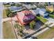 Two-story house with red roof and large backyard at 3726 S Atlantic Ave, New Smyrna Beach, FL 32169