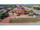 Two-story house with red roof and ocean views at 3726 S Atlantic Ave, New Smyrna Beach, FL 32169