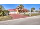 Brick driveway leading to a two-story house with attached garage at 3726 S Atlantic Ave, New Smyrna Beach, FL 32169