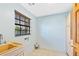 Laundry room with sink and built-in cabinets at 3726 S Atlantic Ave, New Smyrna Beach, FL 32169