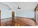 Sunlit living room with hardwood floors and high ceilings at 3726 S Atlantic Ave, New Smyrna Beach, FL 32169