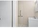 Updated bathroom with walk-in shower and grab bar at 384 W Ariel Rd, Edgewater, FL 32141