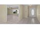 Bright entryway with tile flooring and access to other rooms at 384 W Ariel Rd, Edgewater, FL 32141