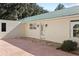 Side view of house, showcasing a patio and entrance at 384 W Ariel Rd, Edgewater, FL 32141