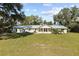 Ranch style home with a large backyard at 384 W Ariel Rd, Edgewater, FL 32141