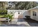 Covered patio with arched entryway, creating a shaded seating area at 384 W Ariel Rd, Edgewater, FL 32141