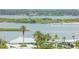 Aerial view of waterfront homes and boat at 3851 S Atlantic Ave # 701, Daytona Beach Shores, FL 32118