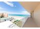 Balcony view of the ocean, beach, and neighboring buildings at 3851 S Atlantic Ave # 701, Daytona Beach Shores, FL 32118