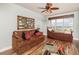 Bedroom with a leather couch and water views at 3851 S Atlantic Ave # 701, Daytona Beach Shores, FL 32118