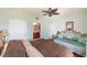 Bedroom with a daybed and access to a bathroom at 3851 S Atlantic Ave # 701, Daytona Beach Shores, FL 32118