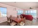 Bright dining room with ocean views and a large table at 3851 S Atlantic Ave # 701, Daytona Beach Shores, FL 32118