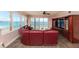 Living room with ocean view and comfortable leather furniture at 3851 S Atlantic Ave # 701, Daytona Beach Shores, FL 32118