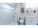 Bathroom with shower, toilet, and white vanity at 3855 S Atlantic Ave # 1105, Daytona Beach Shores, FL 32118