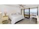 Bedroom with ocean view and balcony access at 3855 S Atlantic Ave # 1105, Daytona Beach Shores, FL 32118