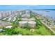 Aerial view of luxurious condo building near ocean, showcasing resort-style amenities at 4 Oceans West Blvd # 502B, Daytona Beach, FL 32118