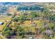 Aerial view highlighting the home's private setting within a wooded area at 4045 Jason St, New Smyrna Beach, FL 32168