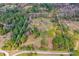 Aerial view showcasing a home's expansive lot and surrounding landscape at 4045 Jason St, New Smyrna Beach, FL 32168