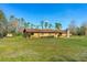 Ranch style home with large backyard and mature trees at 4045 Jason St, New Smyrna Beach, FL 32168