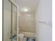 Full bathroom with shower/tub combo and tile floor at 4150 S Atlantic Ave # 112C, New Smyrna Beach, FL 32169