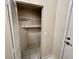 Neat closet with shelving for storage at 439 Bouchelle Dr # 202, New Smyrna Beach, FL 32169