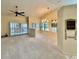 Bright living room featuring a view to the dining area at 439 Bouchelle Dr # 202, New Smyrna Beach, FL 32169