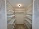 Large walk-in closet with wire shelving at 439 Bouchelle Dr # 202, New Smyrna Beach, FL 32169